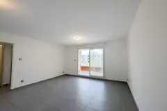 Séjour lumineux ouvrant sur le balcon, Appartement T3 à Saint-Benoît (97470), Stellar Immobilier