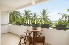 Terrasse avec vue mer et cocotiers, Appartement T3 vue mer, Boucan-Canot à Saint-Gilles, Boucan-Canot (97434), Stellar Immobilier