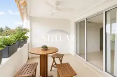 Terrasse aménagée avec coin repas et vue mer, Appartement T3 vue mer, Boucan-Canot à Saint-Gilles, Boucan-Canot (97434), Stellar Immobilier